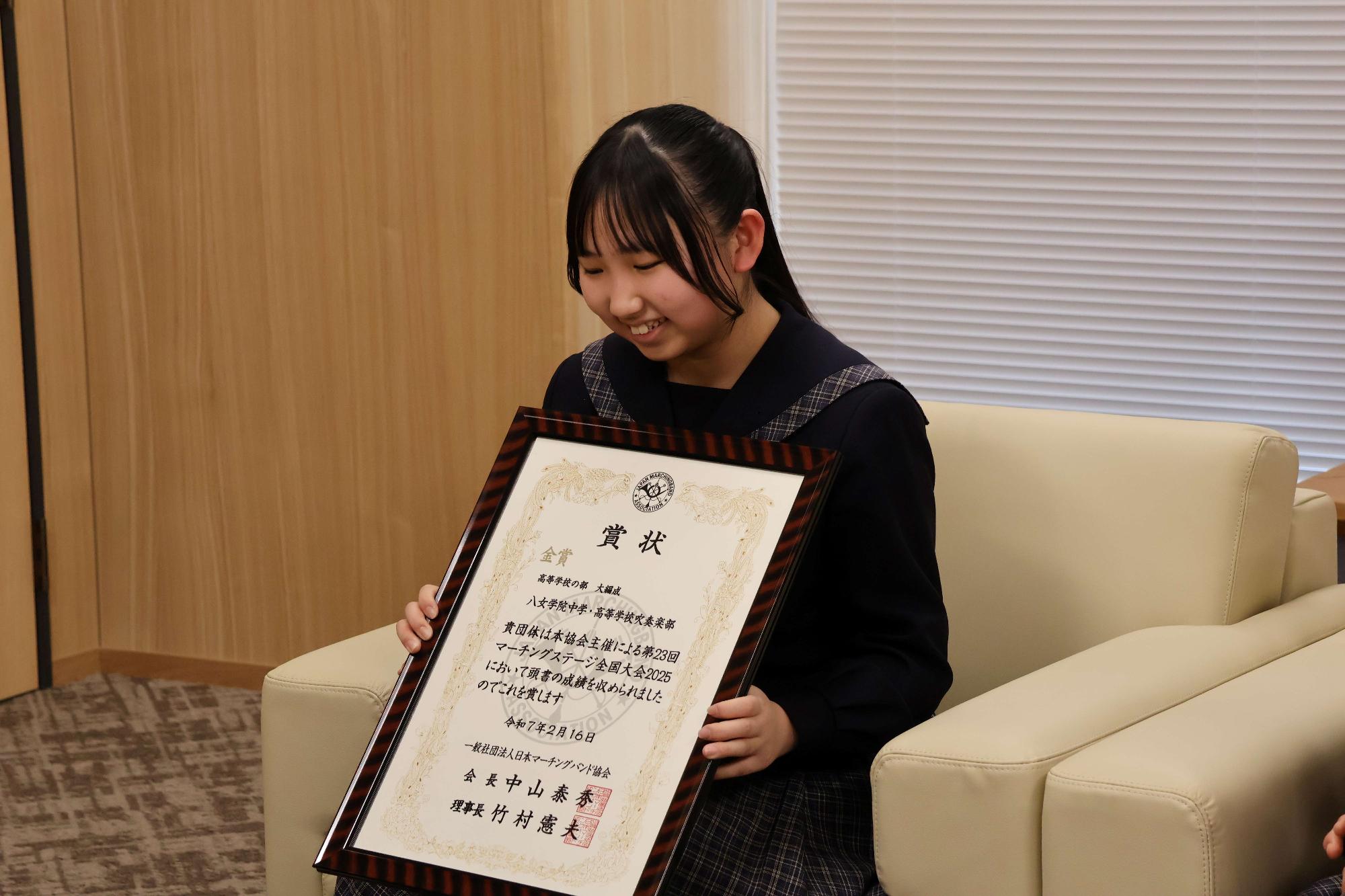 大会結果報告を行う吹奏楽部部長